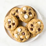 Chocolate Chip and Marshmallow Cookies on a white plate.