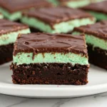 Mint brownies on a white plate.