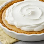No bake pumpkin pie in a white pie dish.