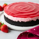 No bake strawberry cheesecake on a white plate.